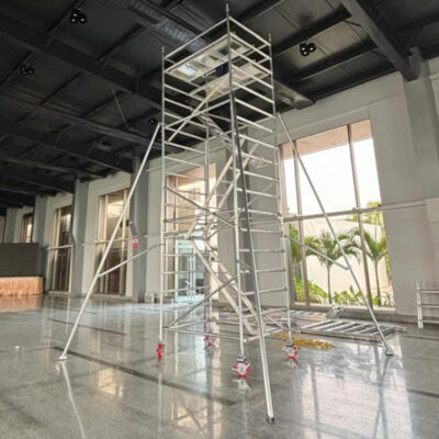 Industrial aluminium scaffolding ladder manufacturer in Hyderabad, mobile tower ladder with wheels and safety platform.