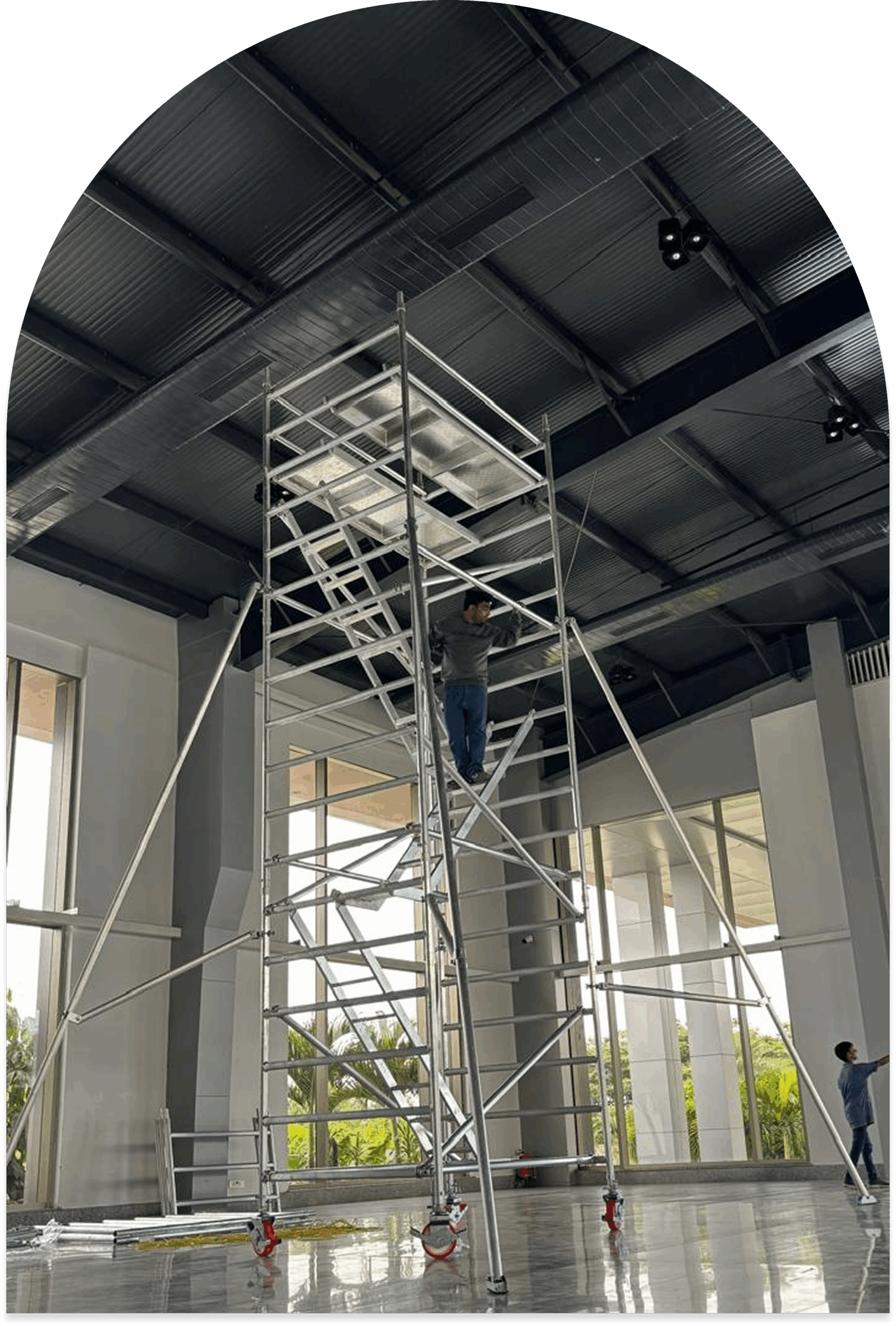 Heavy-duty mobile aluminium scaffolding ladder with wheels for industrial maintenance in Hyderabad